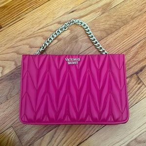 Small bag with long strap and gold strap from VS has a very tiny rip on the back